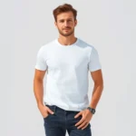 Well-dressed man in casual white t-shirt and dark jeans, standing confidently against neutral background, natural lighting highlighting fabric texture and fit